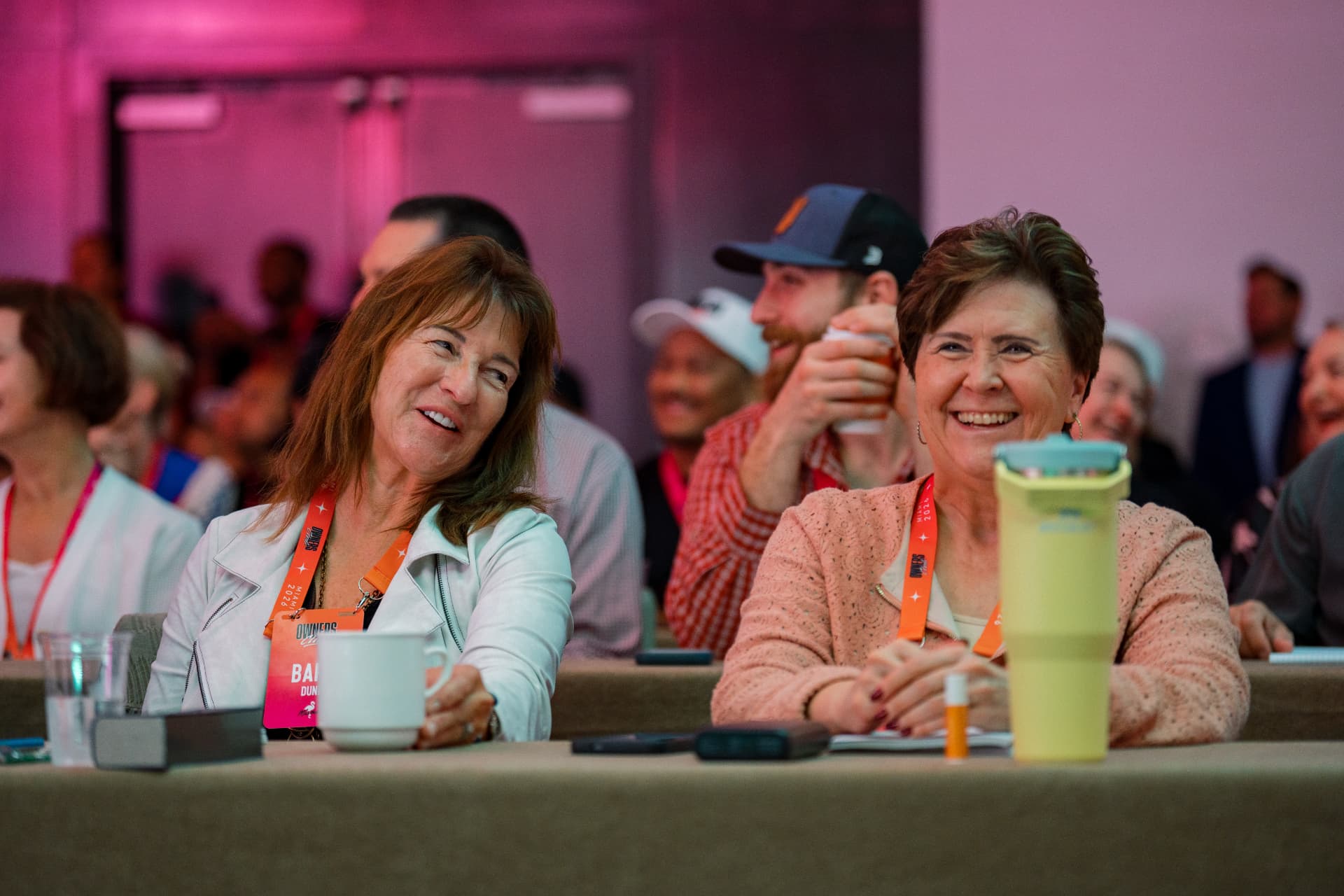 Attendees sharing a laugh